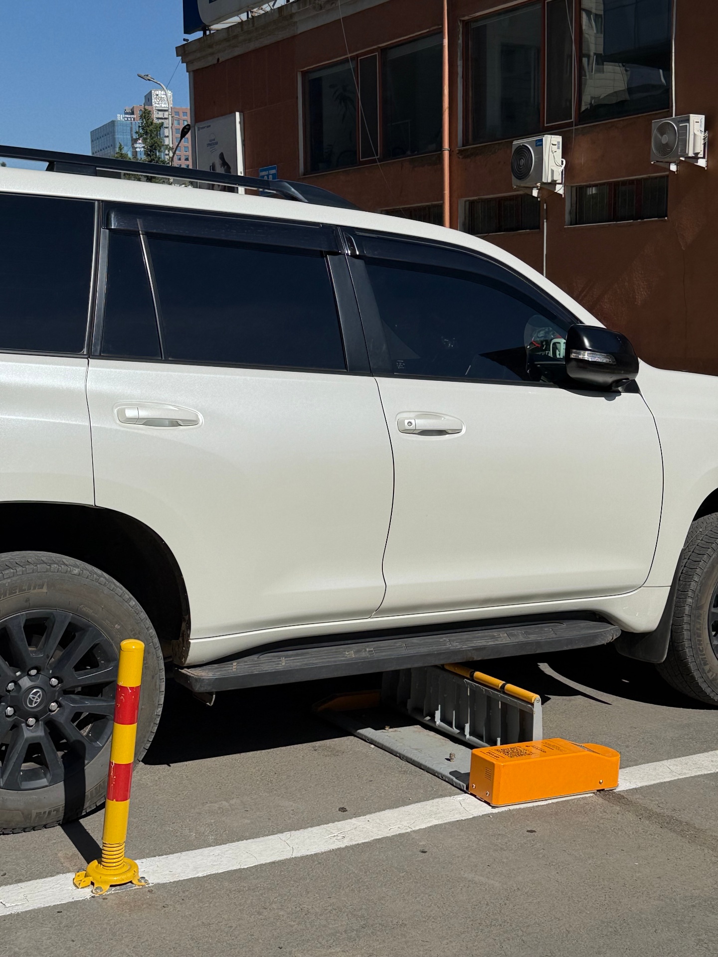 OpenSpot device securing parking bay